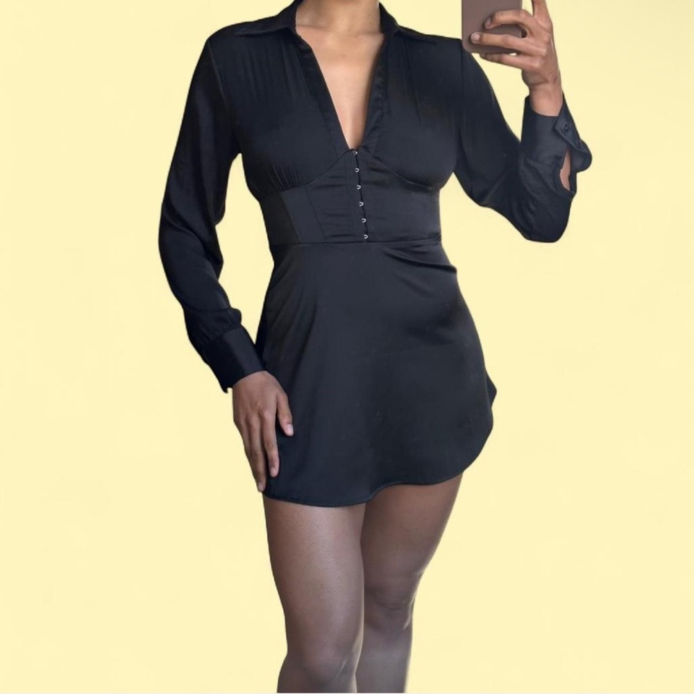 Urban Outfitters Black Garment with Multicolor Branded Label